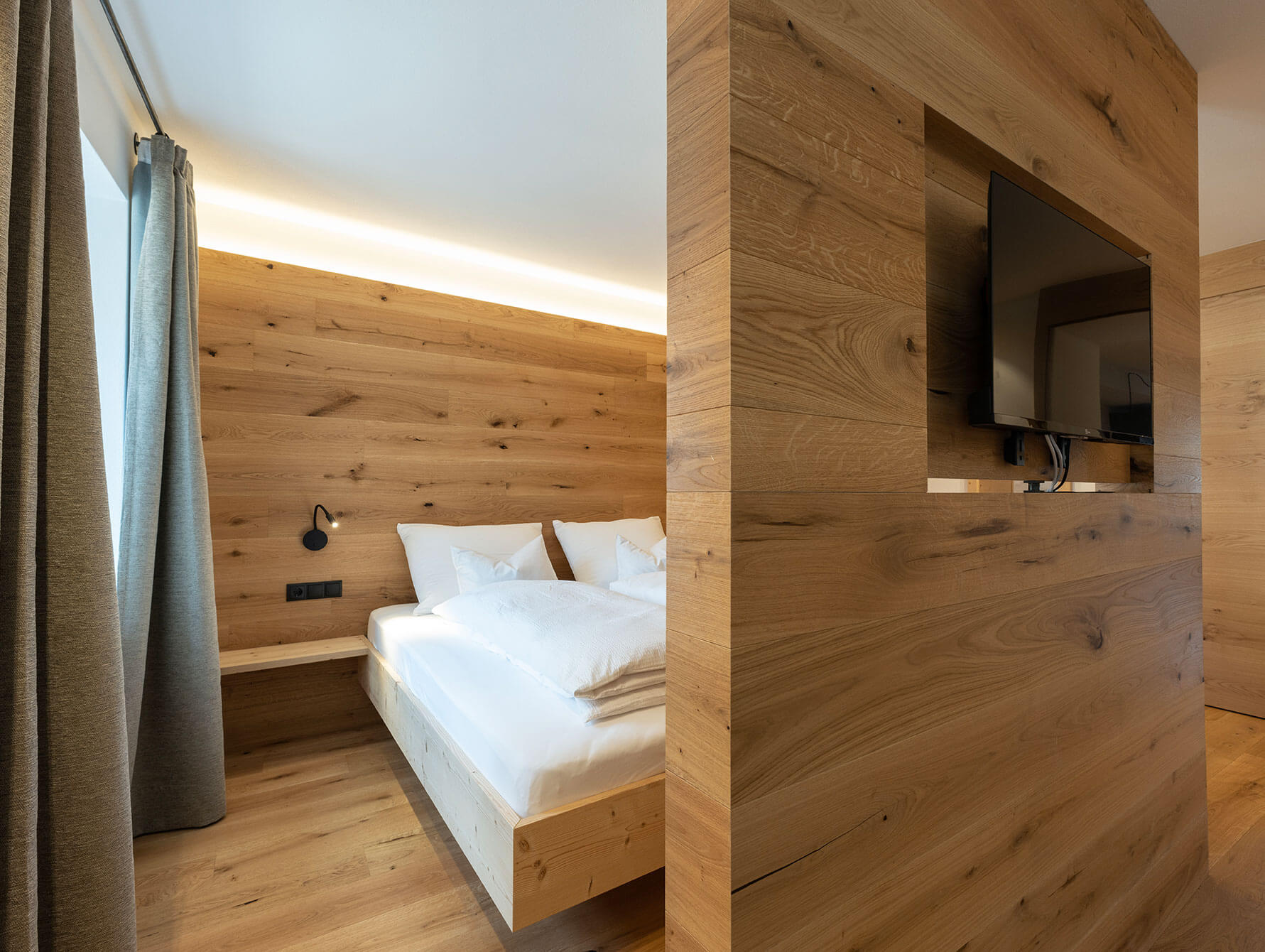 Blick auf Bett - Suite - Residence Kugler